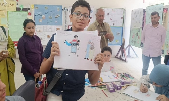 زيارة لجنة التقييم الفني لمعرض الأنشطة الصيفية ومسابقة الكاريكاتير